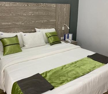 Akwa II Hotel | Relax at Bano Palace Hotel with Pool and Ocean Views
