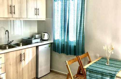 Roda Apartment | Relax in Banos Apartment with Pool Steps from the Beach
