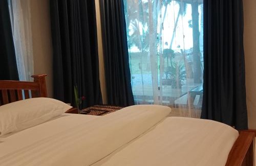 Lang Suan House | Discover บ้านระเบียงเลหลังสวน: Beachfront Haven for Families