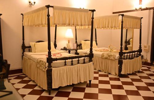 Jorhat Resort | Discover Banyan Grove: Family-Friendly with Breakfast Included