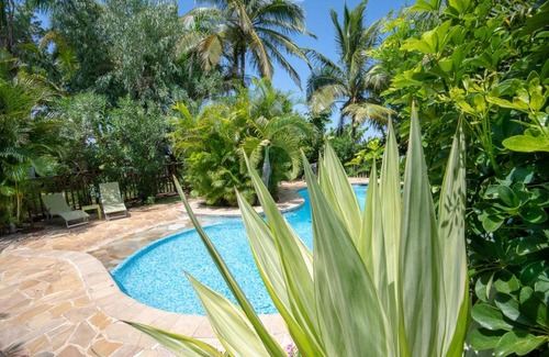 Maniron Cabin | Experience Comfort at Baobab et Palmiers with Pool & Hot Tub
