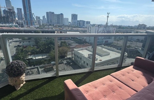 Edgewater Condo | BarB&B A Pink Paradise Awaits