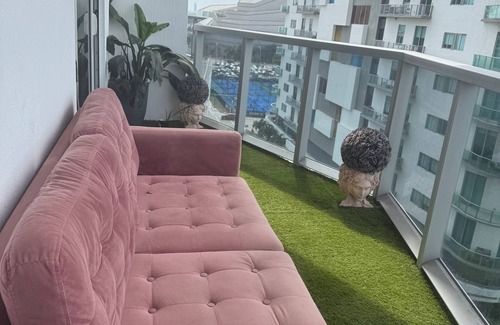 Edgewater Condo | BarB&B A Pink Paradise Awaits
