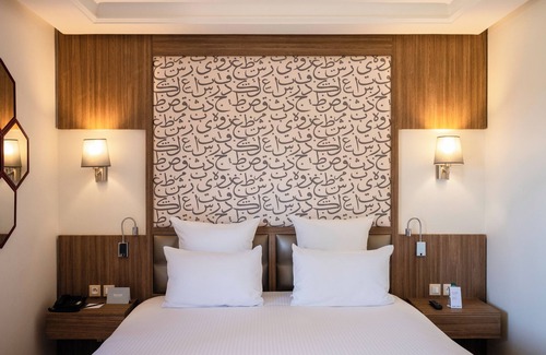 Annakhil Hotel | Elegant Barcelo Palmeraie: 5-Star Retreat with Spa & Pool