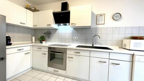 Wulfen Apartment | Family-Friendly Ferienwohnung Heber 9232 in Fehmarn