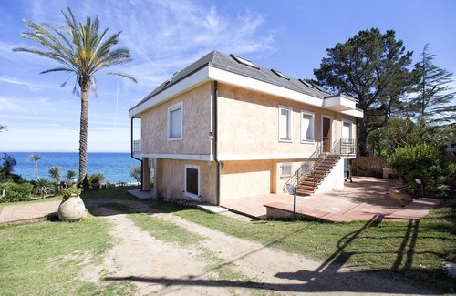 Torre di Bari Apartment | Beachfront Penthouse Retreat in Barisardo with Ocean View