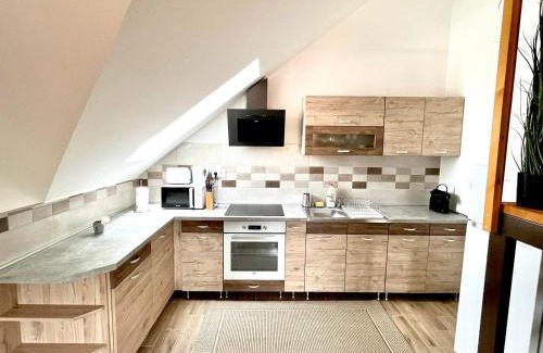 Tarcal Apartment | Comfortable Barkland Apartman: Family-Friendly Getaway