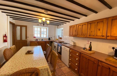 Llangefni Cottage | Inviting Barn Conversion with Pool and Lake View