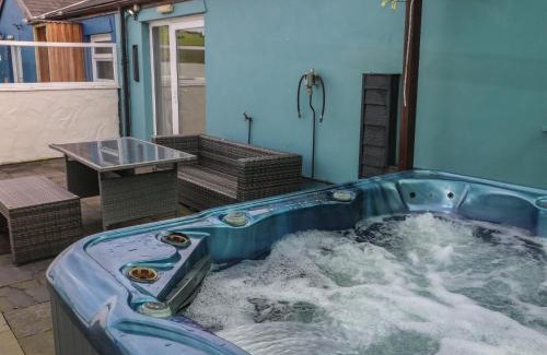Llanybri House | Inviting Barn Cottage: Pet and Child Friendly Retreat