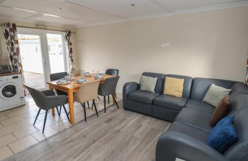 Llanybri House | Inviting Barn Cottage: Pet and Child Friendly Retreat