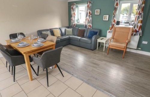 Llanybri House | Inviting Barn Cottage: Pet and Child Friendly Retreat