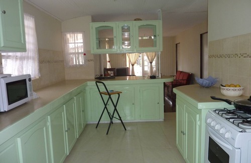 Oistins House | Experience Village Charm at Barry's Place with Ocean Views