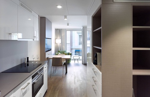 Nyon Apartment | Elegant Base Nyon: 4-Star Comfort with Spa & Dining