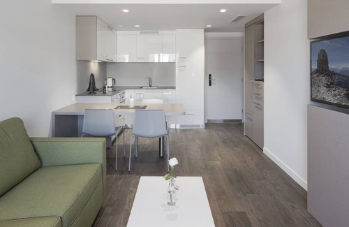 Nyon Apartment | Elegant Base Nyon: 4-Star Comfort with Spa & Dining