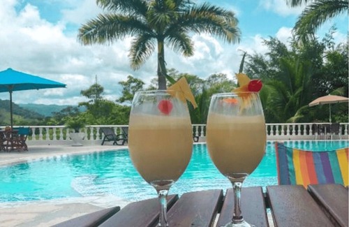 Puerto Triunfo Hotel | Family-Friendly Basica Triple Hotel for Your Perfect Stay