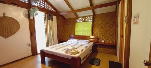 Mambajao House | Exceptional Bat Tree Cottages - Wheelchair Accessible Haven