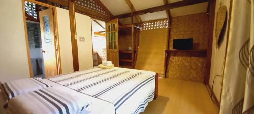 Mambajao House | Exceptional Bat Tree Cottages - Wheelchair Accessible Haven