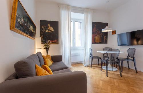 Rione XVIII Castro Pretorio Apartment | Family-Friendly Termini Painting Apartment with Great Reviews