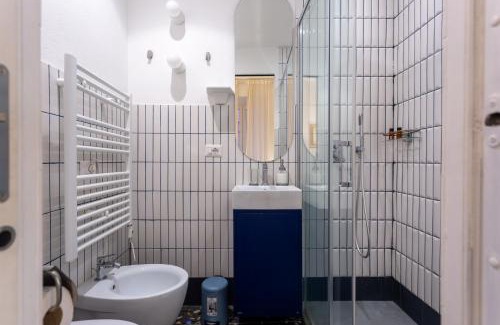 Rione XVIII Castro Pretorio Apartment | Family-Friendly Termini Painting Apartment with Great Reviews
