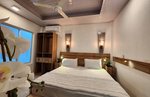 Thulusdhoo Island House | Explore Batuta Maldives Fourson: Family-Friendly Retreat