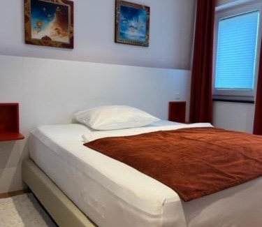 Herz-Jesu-Viertel Apartment | Family-Friendly Stays at Baumann Suiten for Memorable Trips