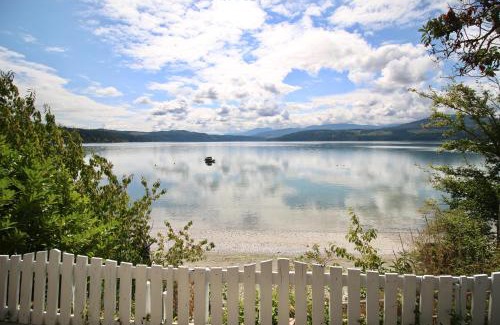 Adelma Beach House | Bay Cottage Getaway: Beachfront Retreat with Ocean Views