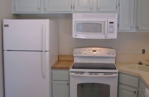 Treasure Island Apartment | Bayfront 2 Bedroom Retreat with Dock and Beach Access