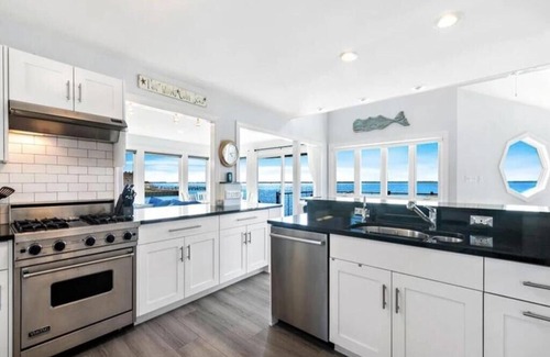 North Beach House | Relax at Bayfront North Beach with Pool & Spa Amenities