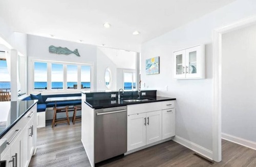 North Beach House | Relax at Bayfront North Beach with Pool & Spa Amenities