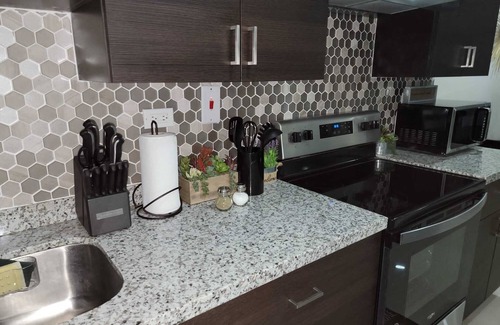 Portmore Apartment | Elegant Bayfront Villas & Apartments with Pool and Breakfast
