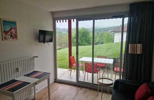 Souraide Apartment | Bayonne Hotel: Poolside Oasis with Mountain Views