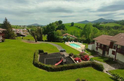 Souraide Apartment | Bayonne Hotel: Poolside Oasis with Mountain Views