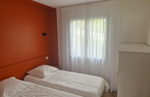 Souraide Apartment | Bayonne Hotel: Poolside Oasis with Mountain Views
