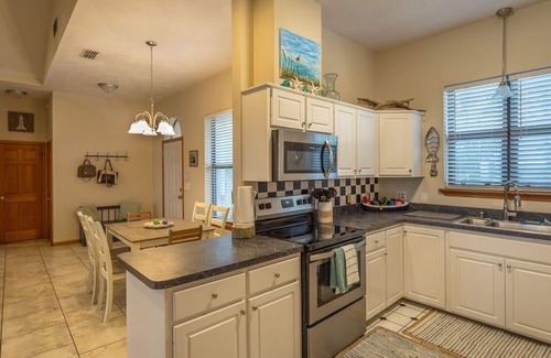 Carrabelle House | Serene Bayou Breeze: Private Waterfront Retreat with Pool