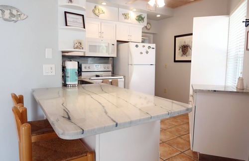Islamorada Villa | Bayside: Pet-Friendly Apartment with Pool & Ocean Views