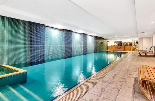 Glenelg Apartment | Relax at Bayside Pines: Resort-Style by Glenelg Beach