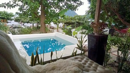 Laurel Bed & Breakfast | Comfortable Baywalk Suites Batangas with Pool & Pet Friendly