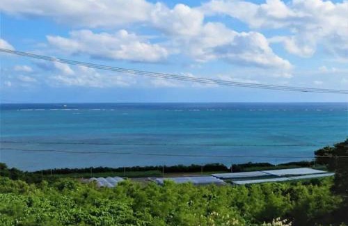 Chinen-son Villa | Private Oceanview Oasis with Hot Tub at Sapphire Resort