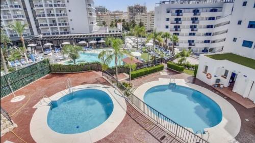 Torrequebrada Apartment | Seaside Penthouse with Pool and Perfect 10 Rating