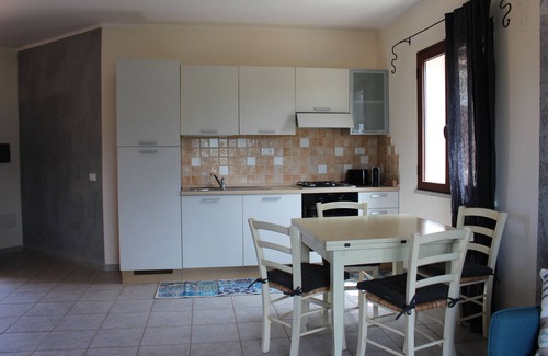 La Muddizza Apartment | Inviting Flat with Balcony, Parking & Family-Friendly Perks