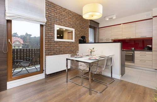 Karwia Apartment | Modern 1 Bedroom Retreat with Balcony and Pet-Friendly Perks