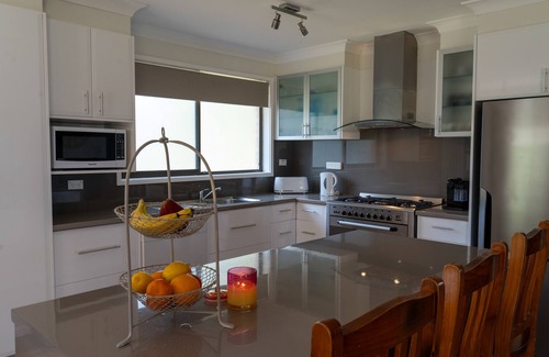 Surfside House | Inviting Beach and Bush Views with Oceanfront Amenities