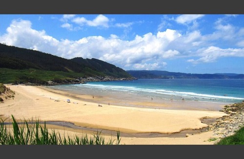 Burela Apartment | Beachfront Escape with Pool and Ocean Views Awaits You
