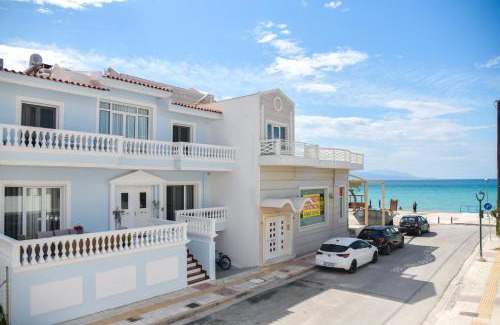 Korithion House | Relax at Beach Blue Villa: Oceanfront Escape Rated 9.9
