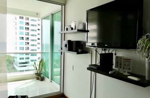 Castillogrande Apartment | Relax by the Beach with Pool Access and Family Amenities