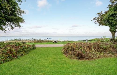 Grønninghoved Strand House | Oceanfront Home in Sjølund with Kitchen & Ocean Views
