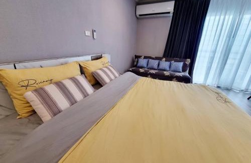 Rayong Apartment | Beachfront Modern Room with Free Wi-Fi & Ocean View