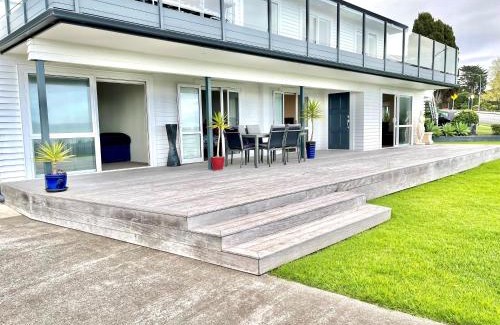 Maraetai House | Oceanfront Bliss: Beach Front Resort with 9.3/10 Rating