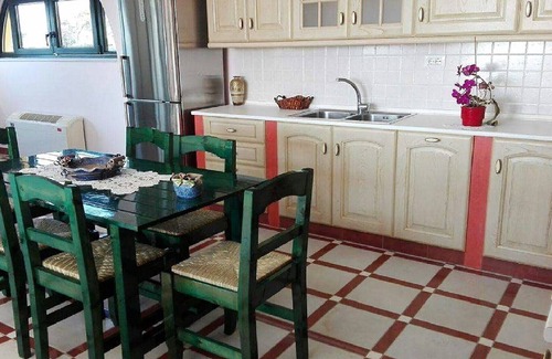 Pyrgos Apartment | Oceanfront Two-Bedroom Apartment with Breakfast Included