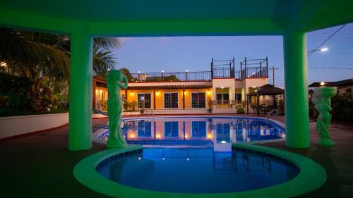 Garapan Apartment | Beach Garden Hotel: Oceanfront Stay with Pool & Breakfast